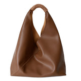Spliced woven shoulder bag